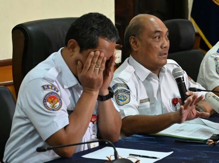 Indonesian air safety officials Soerjanto Tjahjono (R), and Nurcahyo briefed journalists in Jakarta during a March 21, 2019 news