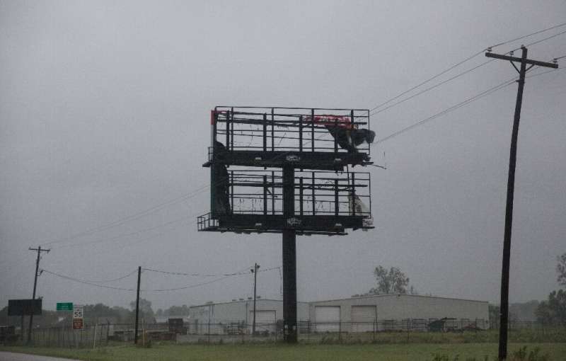 In Jeanerette, Louisiana, Tropical Storm Barry's strong winds tore apart a billboard on July 13, 2019