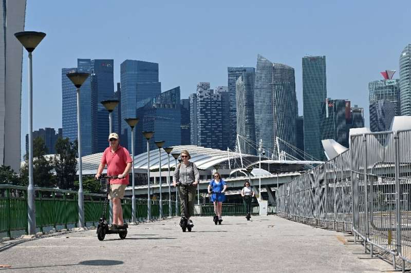 In Singapore, only the 85,000 registered e-scooters with a licence plate are allowed on the city's bike paths, with offenders fa