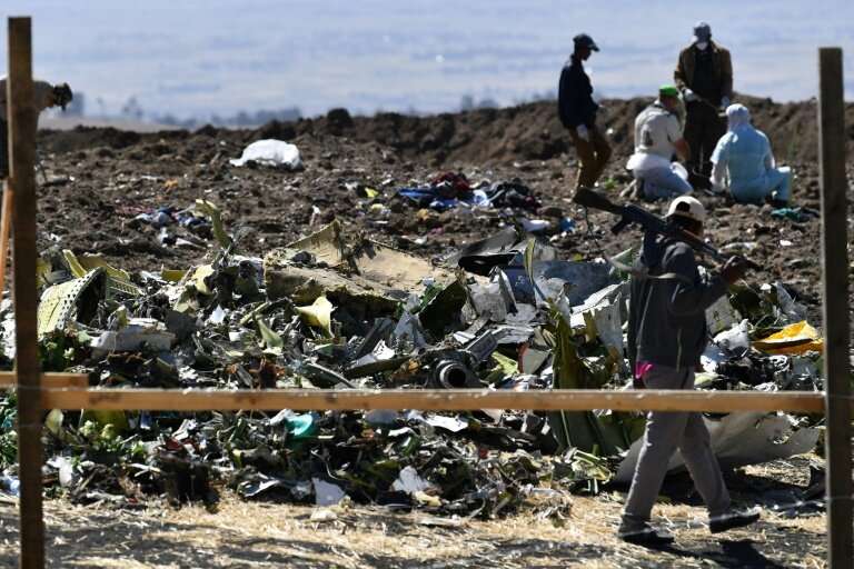 Investigators in Ethiopia comb the site of the Boeing 737 MAX crash on March 16, while flight data information will be scrutiniz