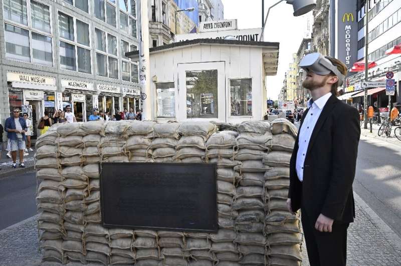 Jonas Rothe, pictured at Checkpoint Charlie, says his virtual reality tours  tap into a desire for &quot;authentic&quot;, intera