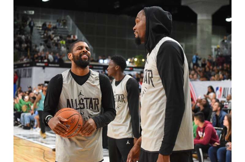 Kyrie Irving, left, and Kevin Durant of the Brooklyn Nets could have a new NBA boss as reports have Alibaba Group co-founder Jos