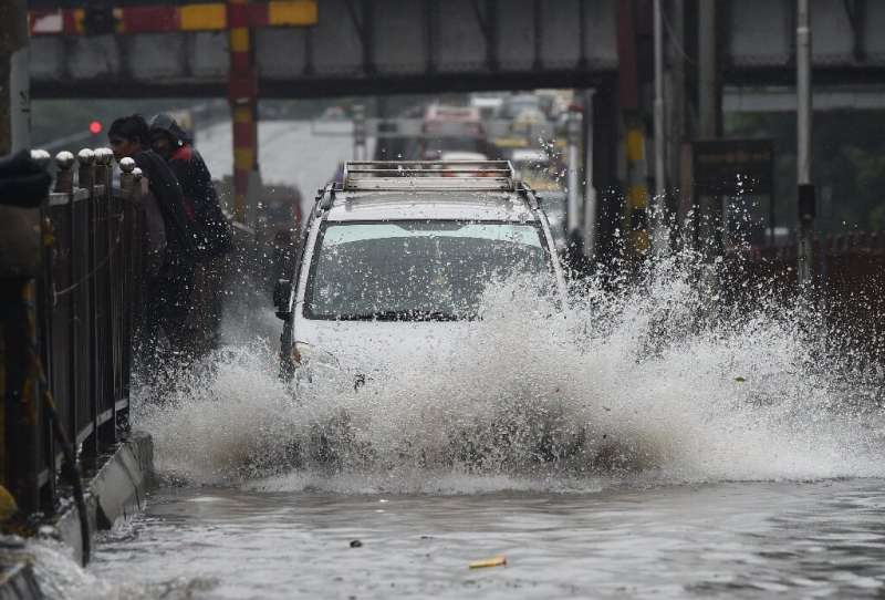 Many streets in India's financial hub of Mumbai were flooded by the mnonsoon downpour