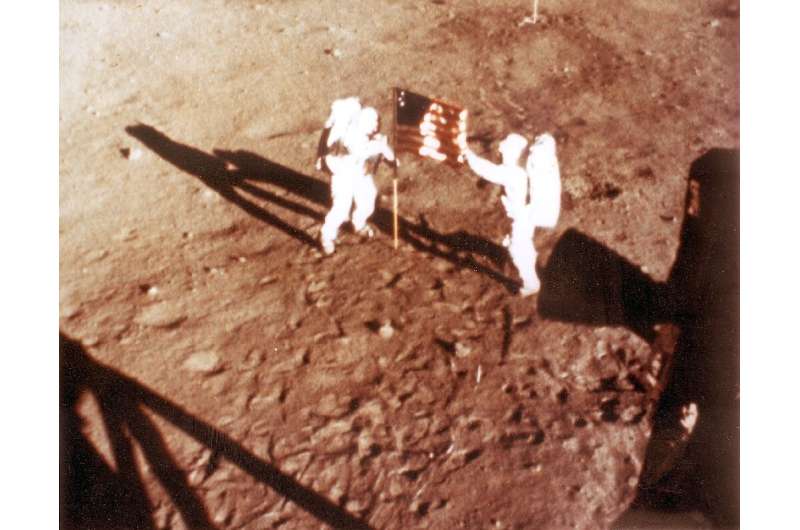 Neil Armstrong and Buzz Aldrin stand on the Moon on July 20, 1969