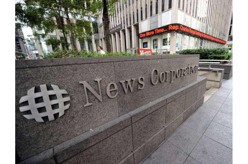 News Corp posted a net profit of $23 million in the third quarter compared to an exceptional loss of more than $1 billion last y