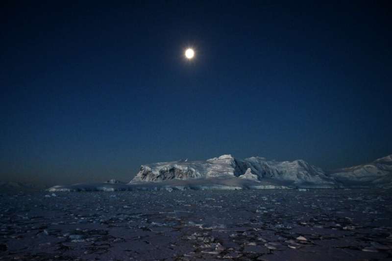 Night view of glaciers at Chiriguano bay in the South Shetland Islands, Antarctica