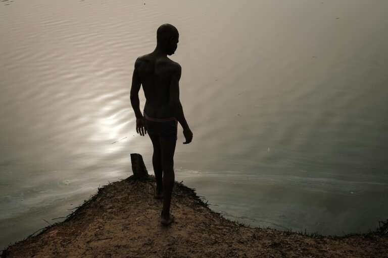 Ogoniland's maze of rivers and creeks are slicked black with oil, and nothing grows or survives