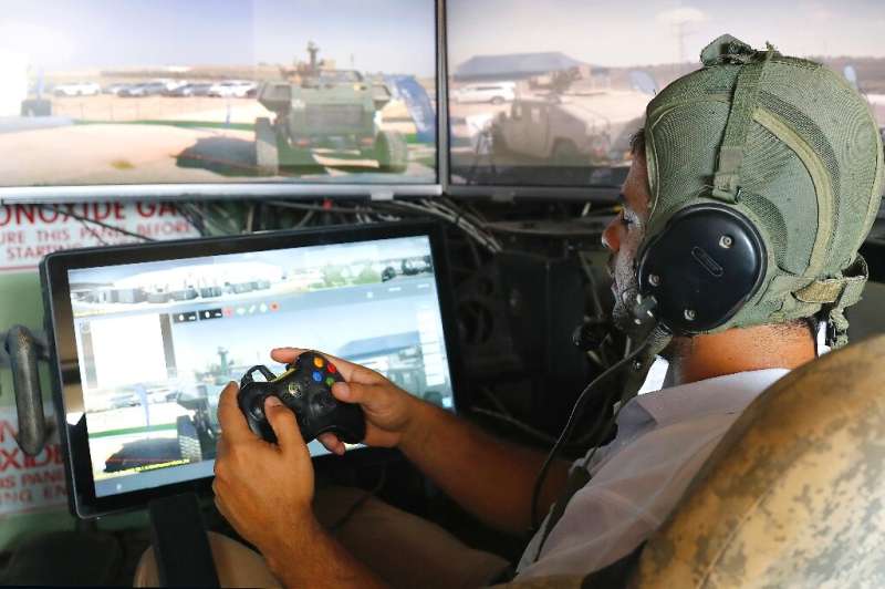 One of the tank systems, developed by Elbit Systems, is operated using a controller like that of a video game console
