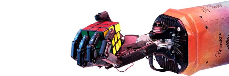 OpenAI's robot hand makes the moves for Rubik's cube