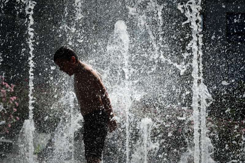 Paris fountains are fair game to cool down during the heatwave