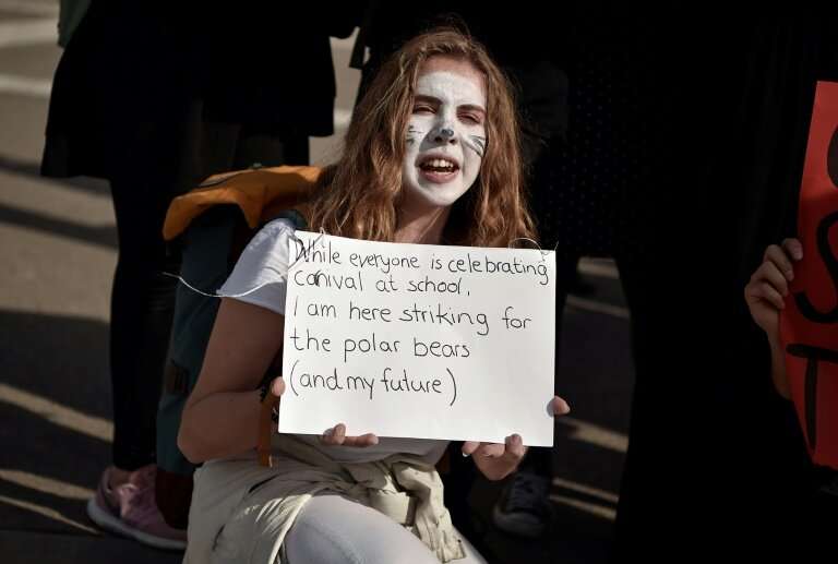 Protest: A student at a demonstration against climate change in Athens last Friday