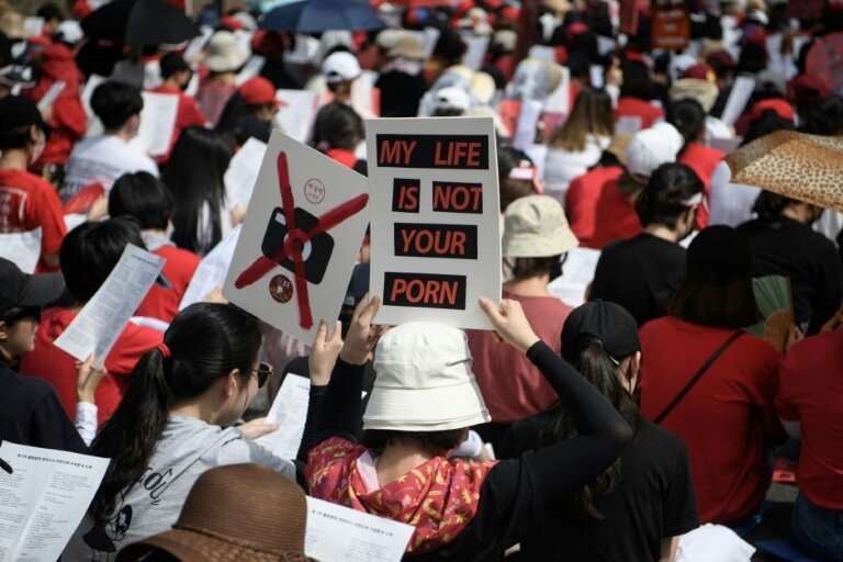 Protesters in South Korea have been calling for the government to crack down on widespread spycam porn crimes