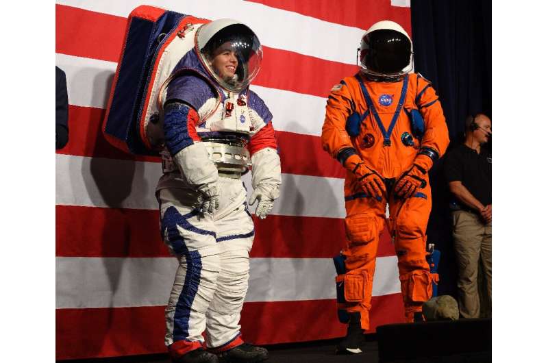 Prototypes of the Orion Crew Survival Suit (R), which will be worn on the way to the Moon, and the Exploration Extravehicular Mo
