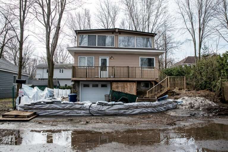 Residents in Laval, just north of Montreal, erected barriers with sandbags to ward off flooding