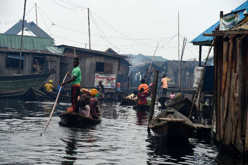 Several hundred thousand people live in Makoko—a floating slum that officially does not exist
