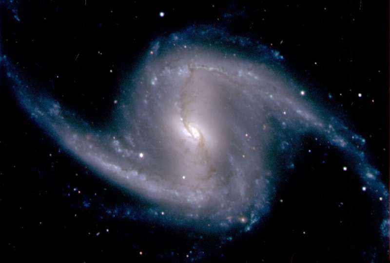 Spiral galaxy NGC 1365 observed from Chile in 2012—a new method gauges how to measure the universe's accelerating growth