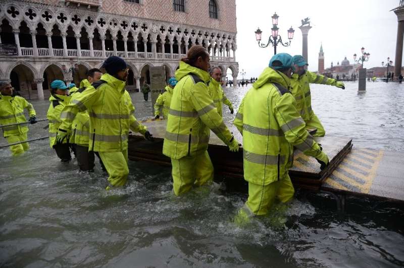 St Mark's Square had been shut for several hours on Friday as strong storms and winds battered the region