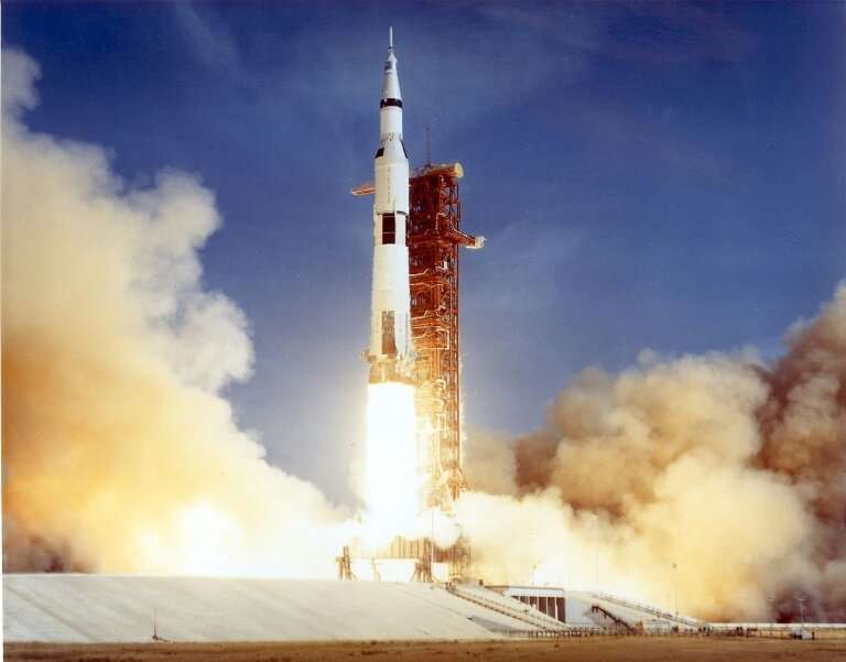 The Apollo 11 Saturn V space vehicle lifts off on July 16, 1969 with astronauts Neil Armstrong, Michael Collins, and Edwin &quot