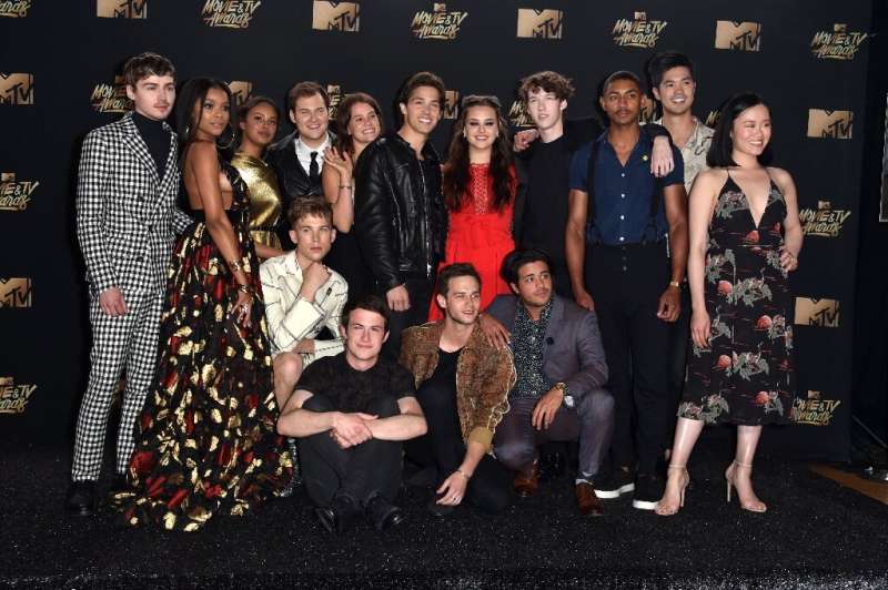 The cast of '13 Reasons Why' poses in the press room during the 2017 MTV Movie And TV Awards