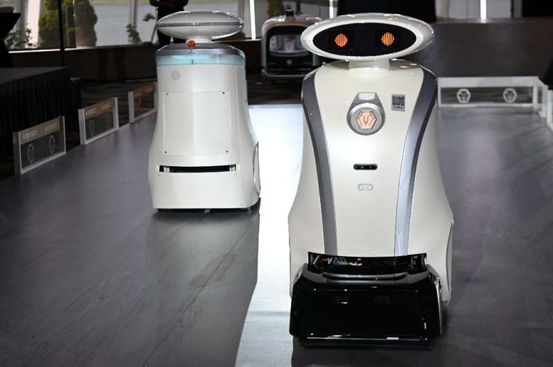The cleaning robots speak all four of multi-ethnic Singapore's official languages