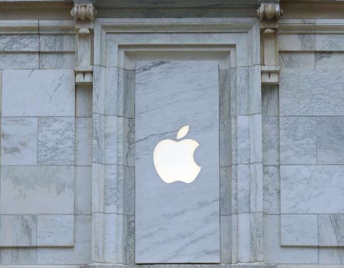 The famous Apple symbol is kept minimal on the outside the new Carnegie Library set to open as an Apple retail store and history