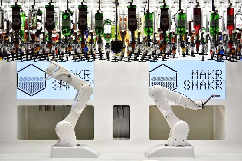 There are robots of all shapes and sizes, including a large mechanical arm that mixes and shakes cocktails