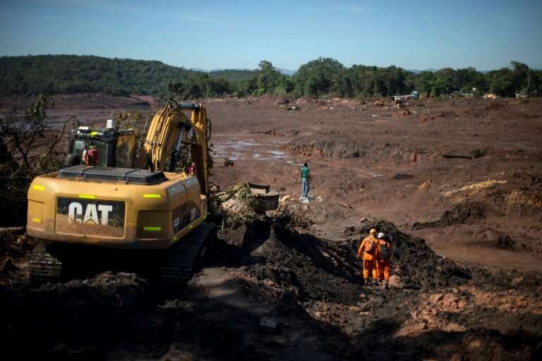 The search goes on to recover the dozens of bodies still buried in the mineral-laced mud following the collapse of a dam in Braz
