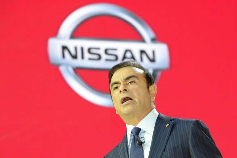 The then Nissan Motor president Carlos Ghosn speaking to reporters in 2013