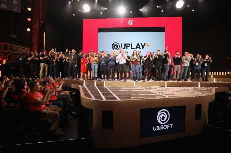 The Ubisoft team poses on-stage following the Ubisoft E3 2019 Conference at the Orpheum Theatre on June 10, 2019 in Los Angeles,