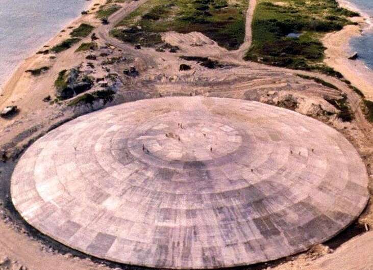 This 1980 picture released by the US Defense Nuclear Agency shows a huge dome over a crater left by a nuclear test blast. The do