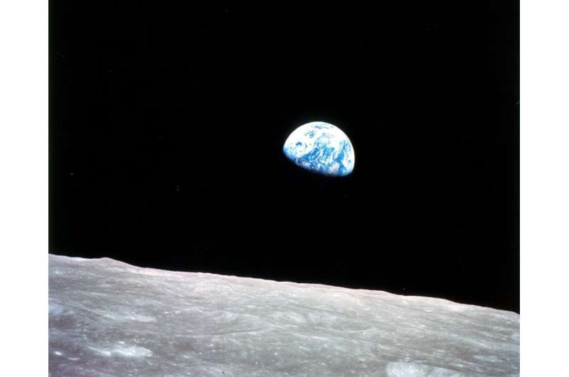 This NASA image shows the Earth as seen from Apollo 8 as it entered lunar orbit on December 24, 1968