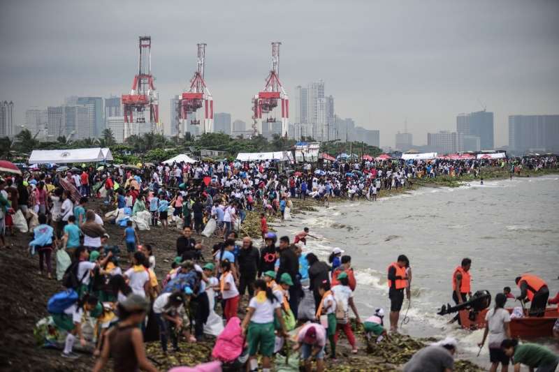 Thousands turned out in Philippines to scour heavily polluted Manila Bay for trash