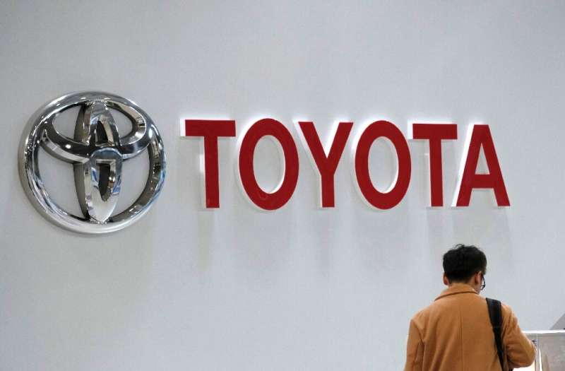 Toyota booked record sales but its profits were stlil down by a quarter