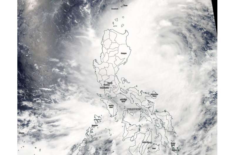 Tropical Depression Danas affecting Philippines in NASA satellite imagery