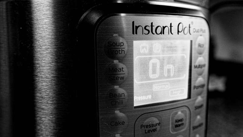 Why does food cook faster in a pressure cooker?