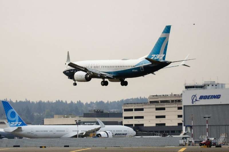 A Boeing 737 MAX airliner piloted by Federal Aviation Administration (FAA) Administrator Steve Dickson lands following an evalua