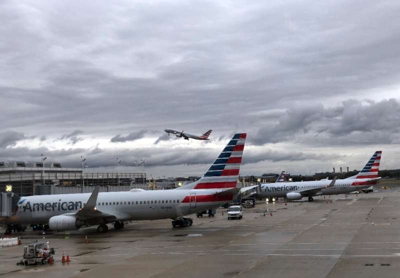 American Airlines reported a jump in fourth-quarter profits on continued strong consumer demand that offset the hit from the 737
