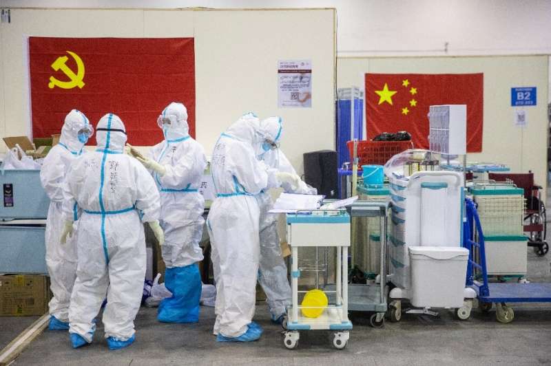 China has placed about 56 million people in hard-hit central Hubei under quarantine, virtually sealing off the province from the