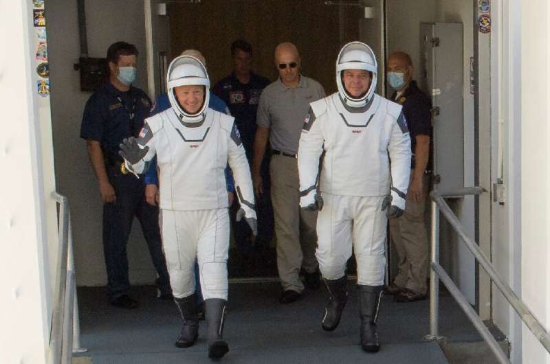 Douglas Hurley an Robert Behnken are seen in their spacesuits on May 23, 2020