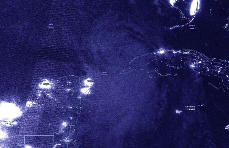 NASA gathers nighttime images of Laura becoming a Hurricane