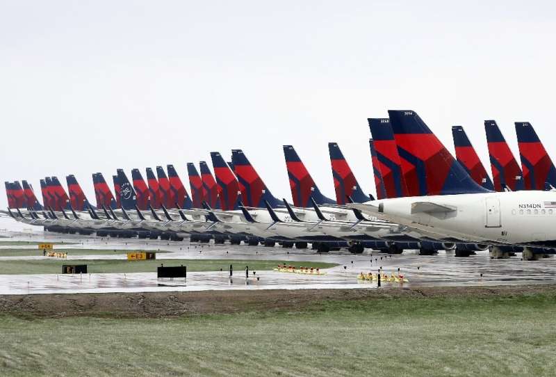 Planes belonging to Delta Air Lines sitting idle at Kansas City International Airport earlier this month