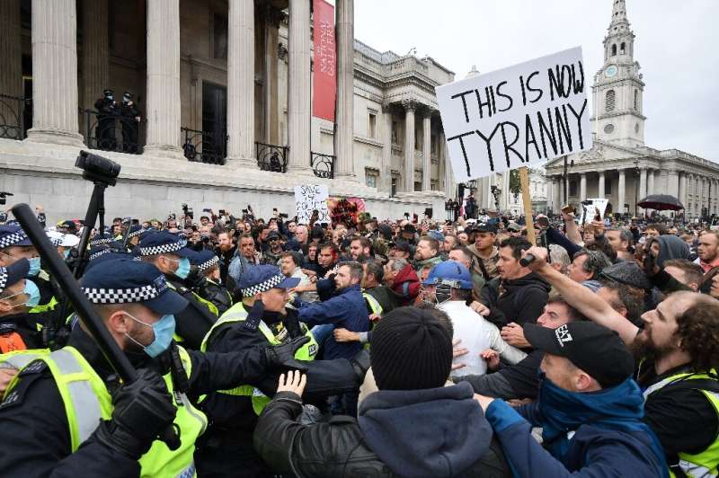 Police move in on lockdown protesters in London's Trafalgar Square