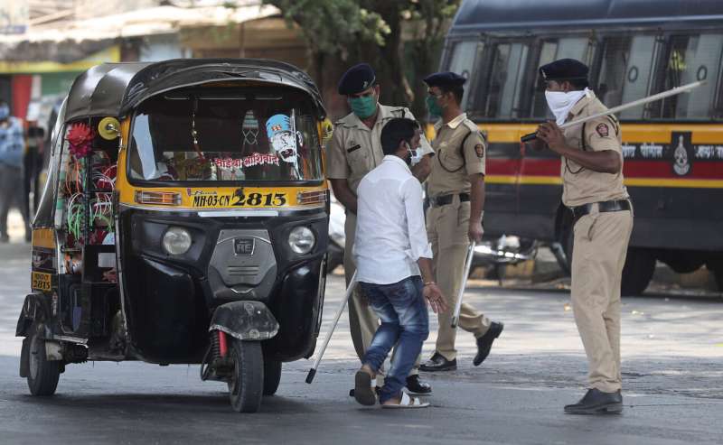 Police struggle to enforce India's sweeping virus lockdown