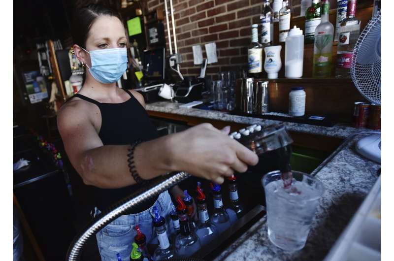 Rising virus totals force rethink of bars, schools, tourism
