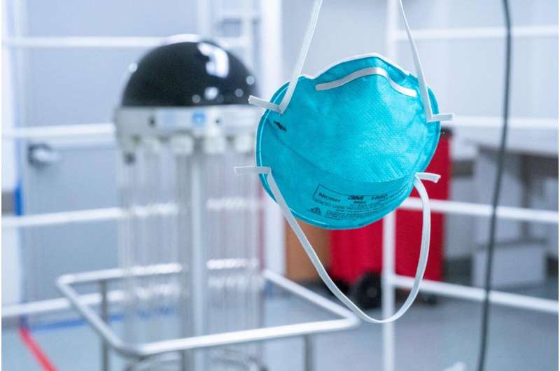 Robot allows clinicians to reuse thousands of masks in the COVID-19 fight