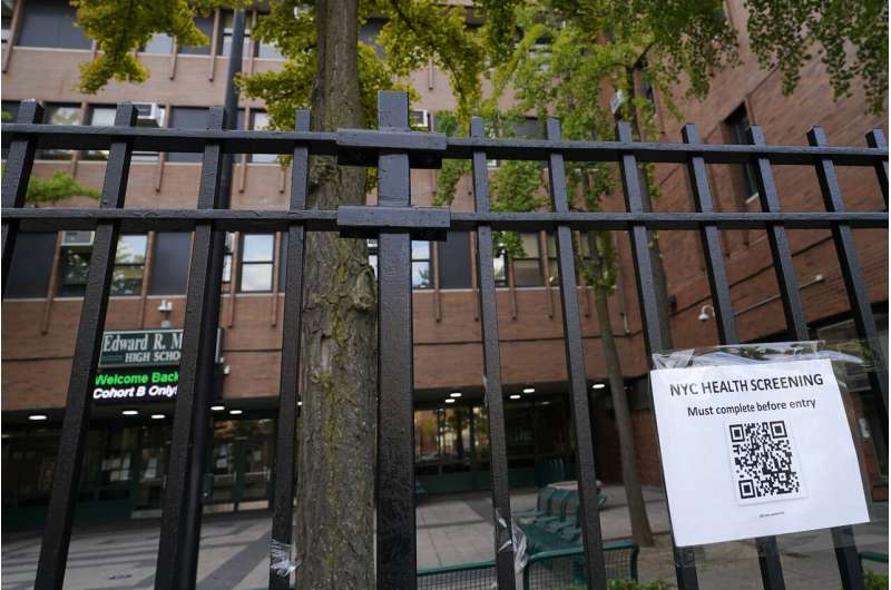 Schools closed in virus hot spots as NYC battles flare-ups