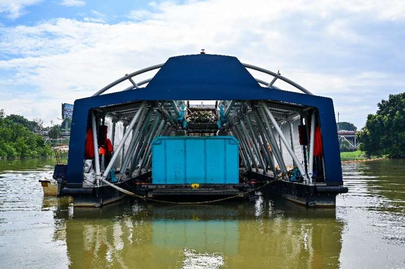 The Interceptor barge can collect up to 50 tons of waste a day