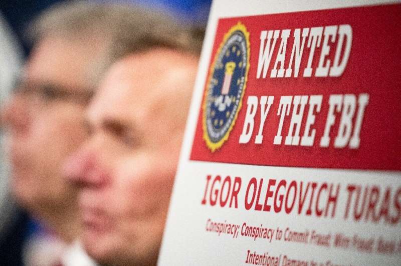 Two Russian nationals indicted on charges of hacking in December are believed to be behind a new ransomware scheme targeting US 