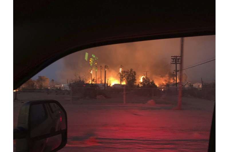 Wildfire burns homes in Southern California desert town
