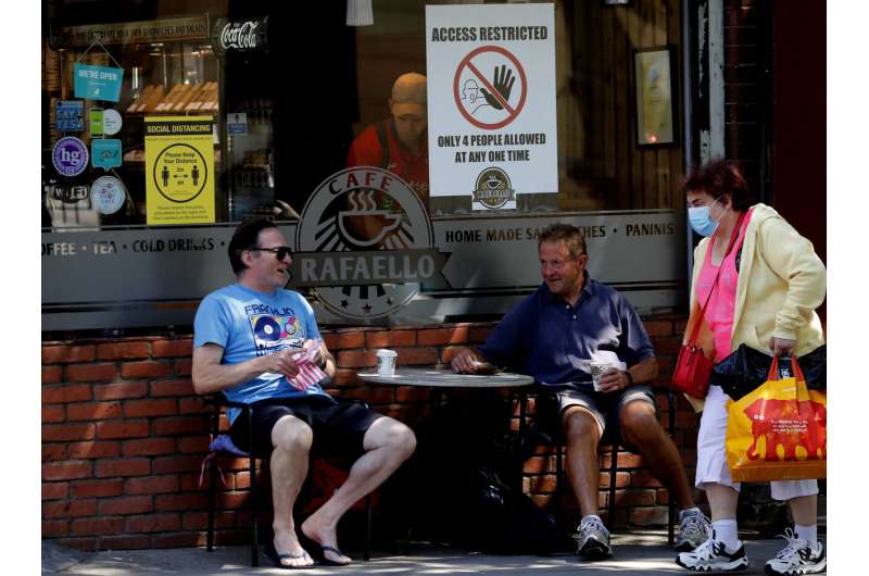 Pubs, restaurants in England to reopen as virus toll eases